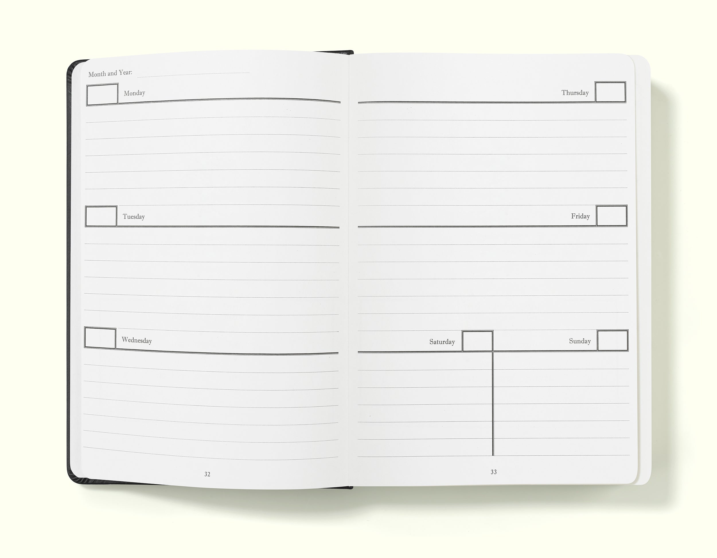 week-to-view diary pages of black weekly planner in a5 on a blank background