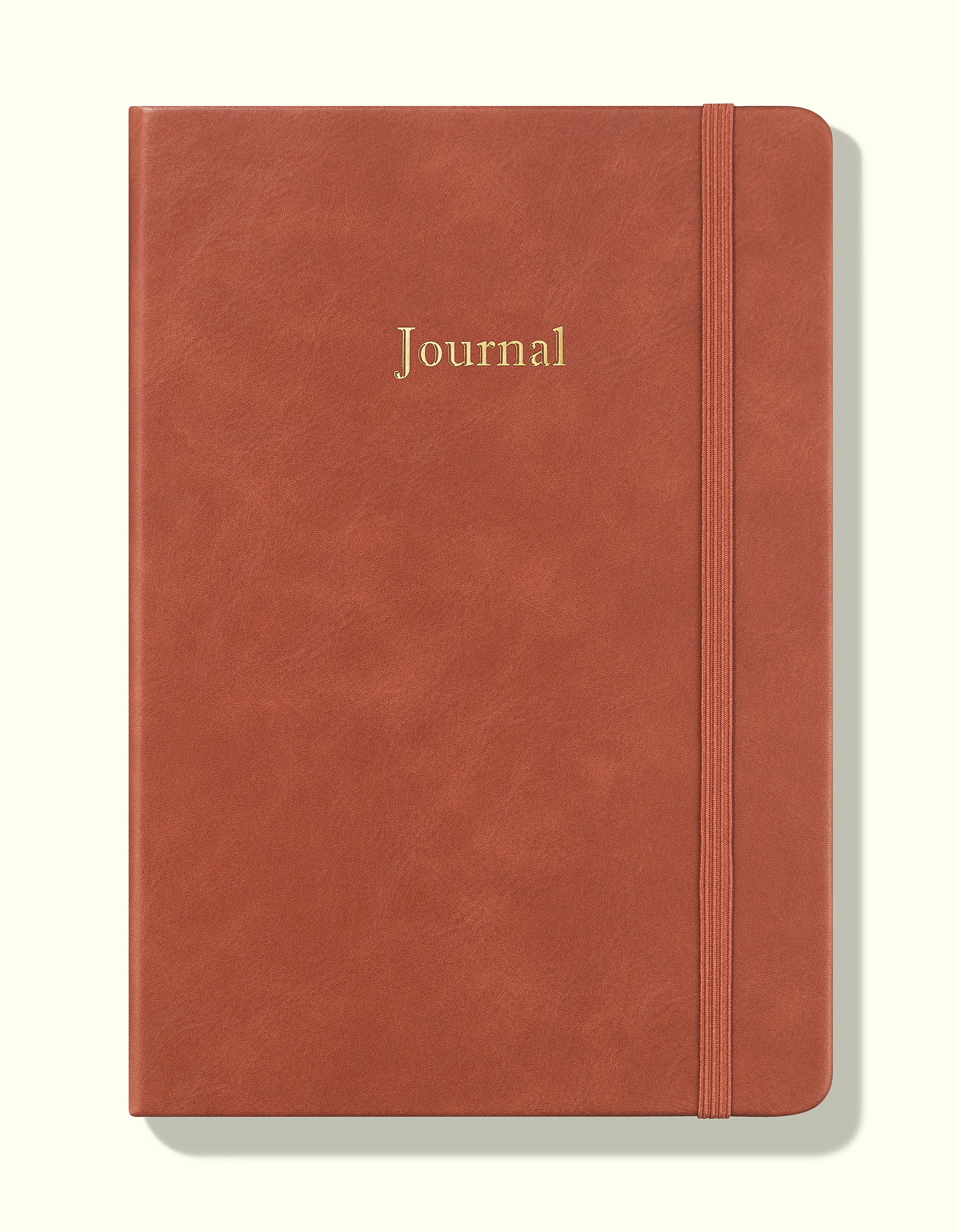 front cover of brown financial planner and budgeting book in a5 on a blank background