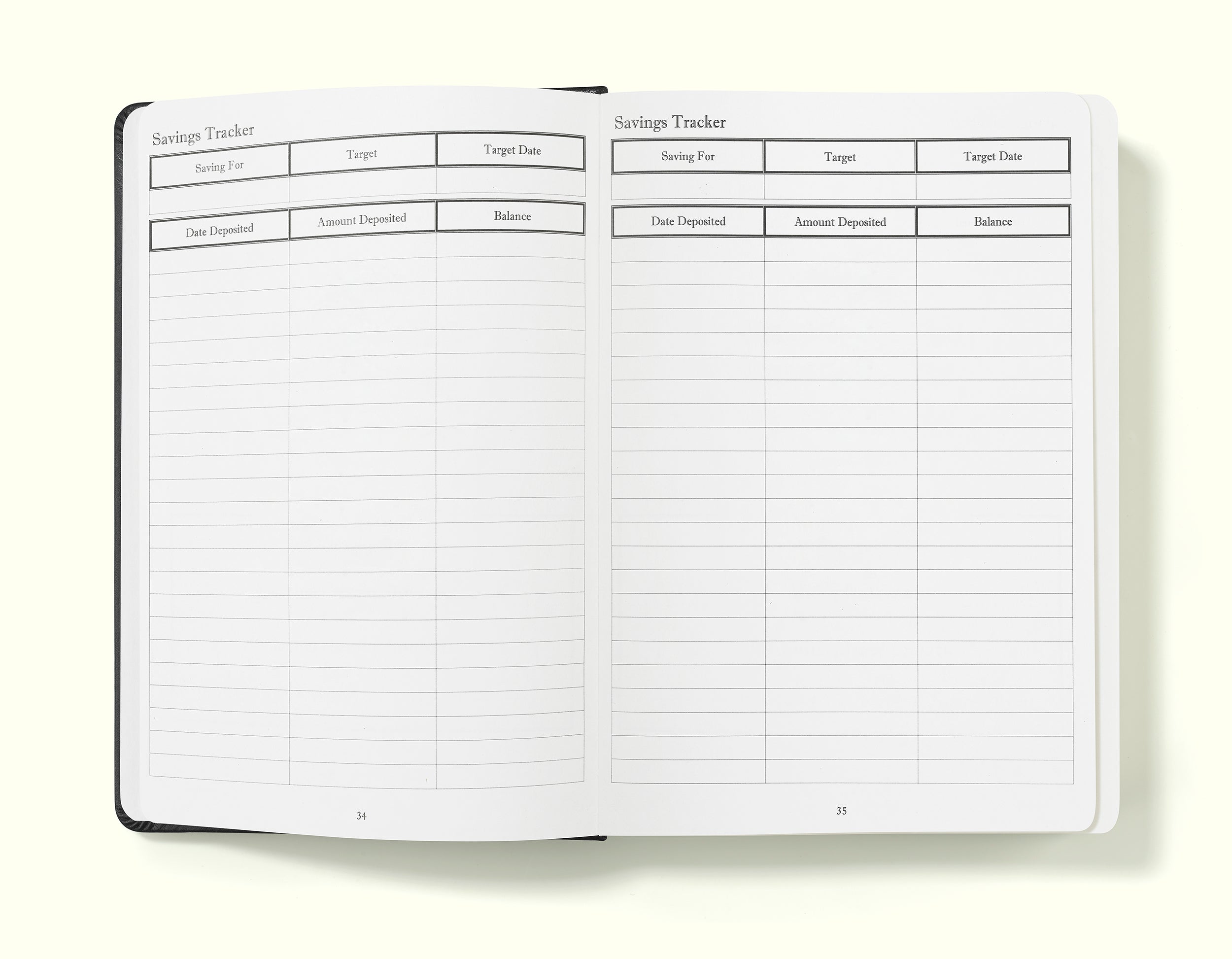 savings tracker of black financial planner and budgeting book in a5 on a blank background