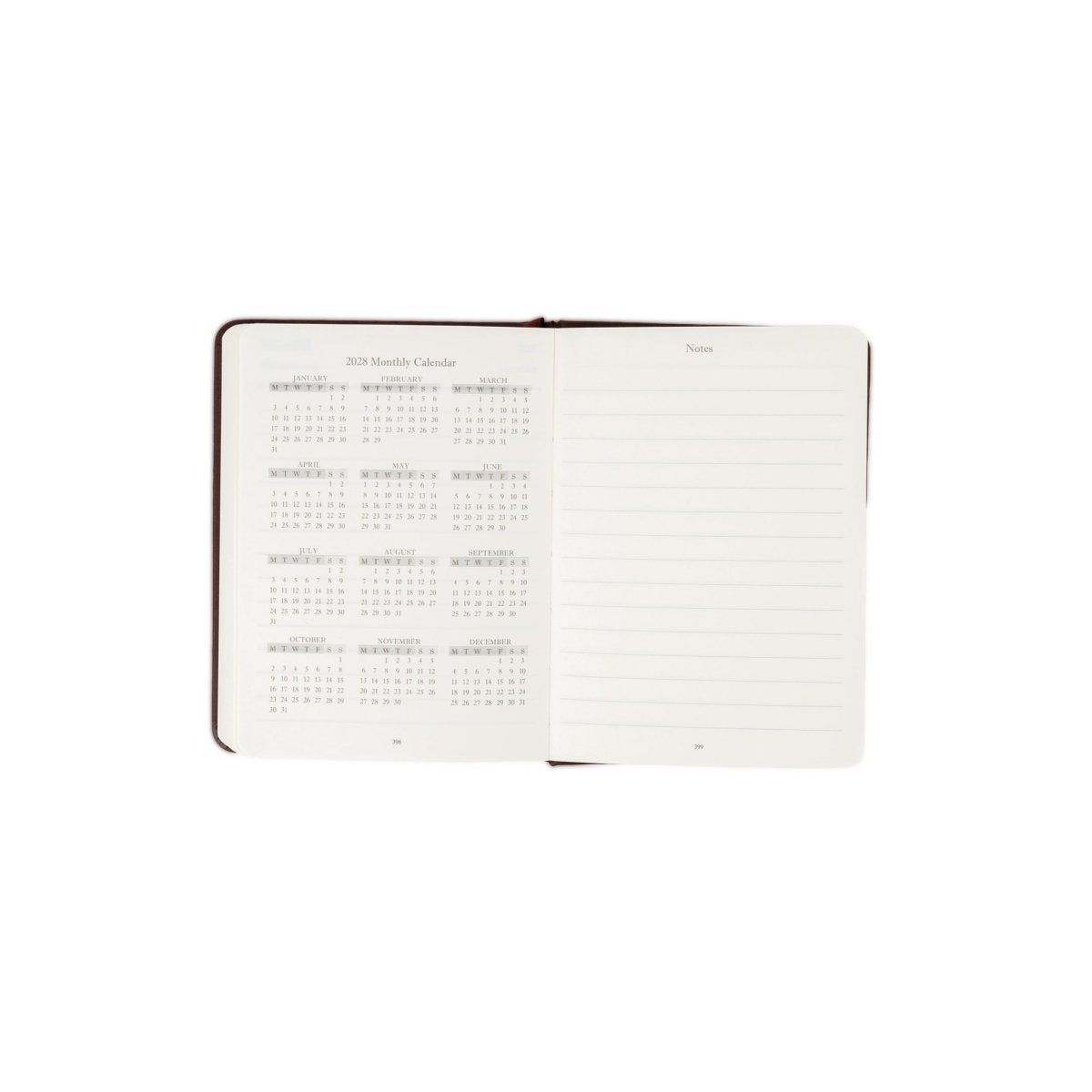 Executive journal open to dated monthly and lined planning pages