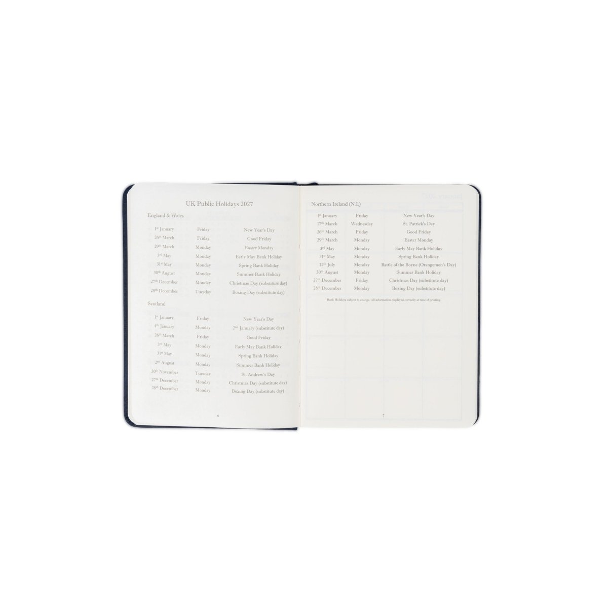 Dark-edged 2027 executive journal open to contents list and notes pages.