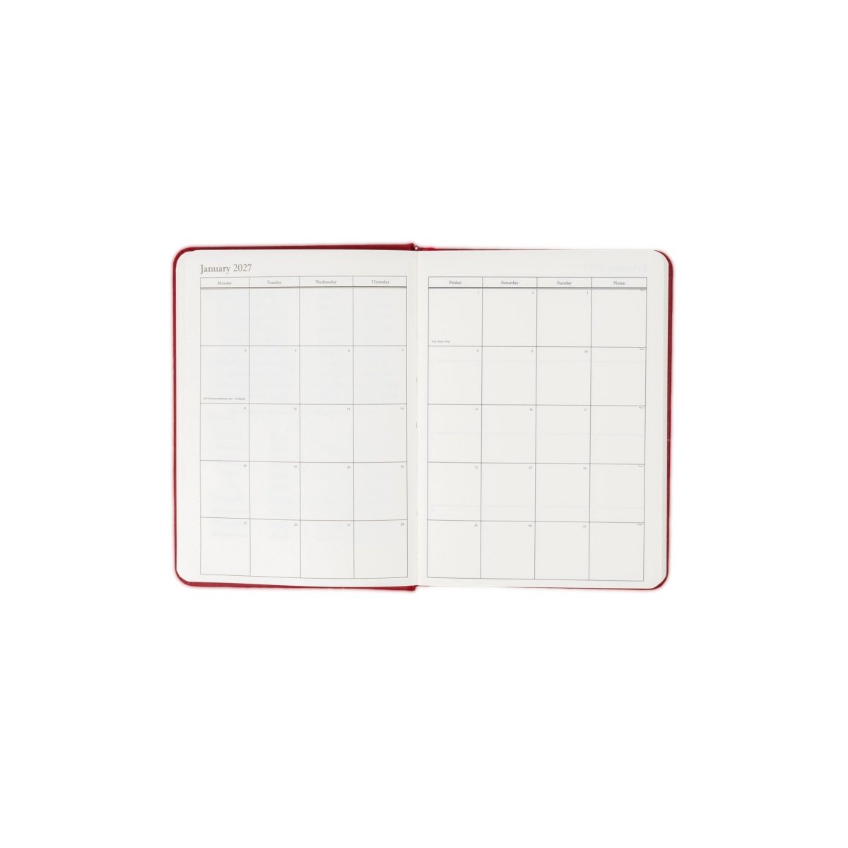 Planner interior open spread with monthly calendar grids and clean lines