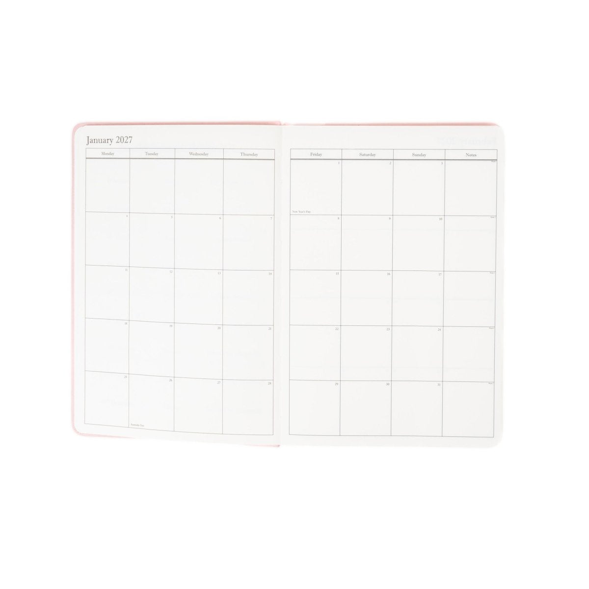Open monthly calendar spread with grid layout and blank sections for notes
