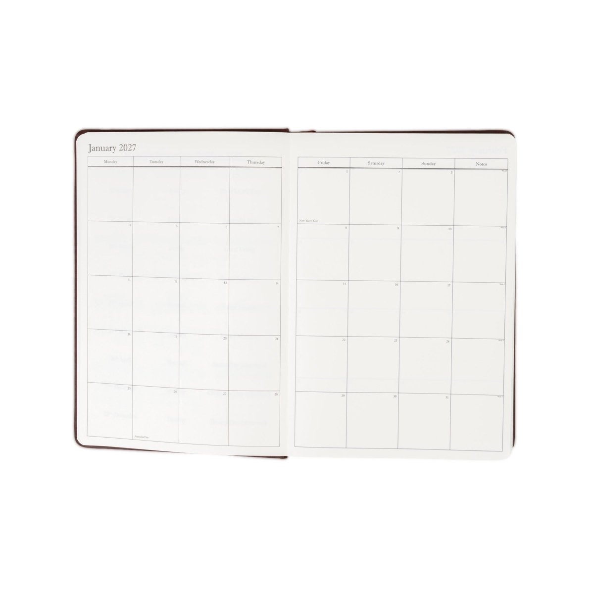 2027 journal open to two monthly planning grids with blank writing areas