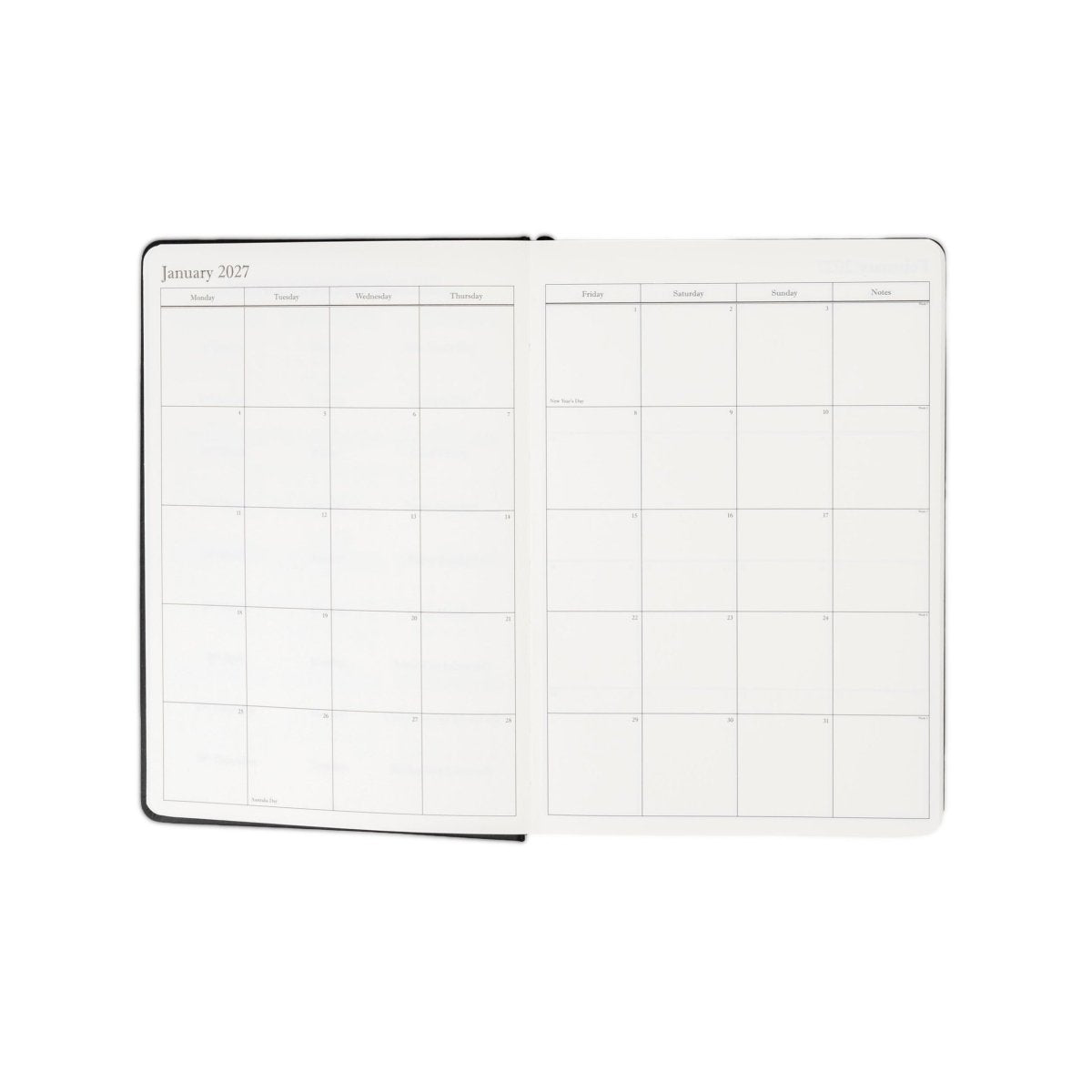 Opened 2027 monthly calendar spread with bordered grid month-view pages