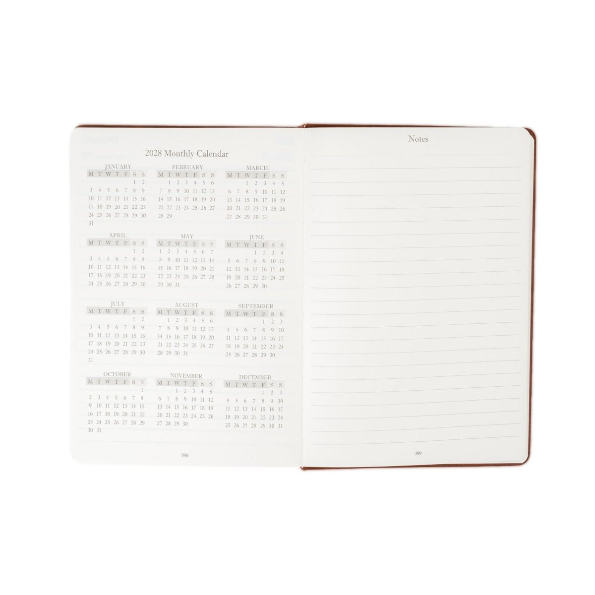 Open executive journal with monthly calendar on left and “Notes” section on right