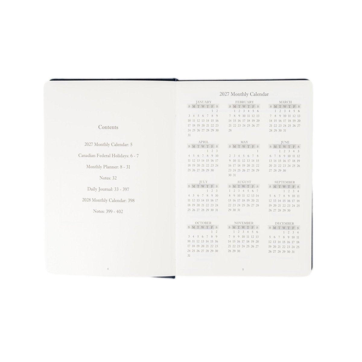 Executive journal open to contents and 2027 monthly calendar pages.