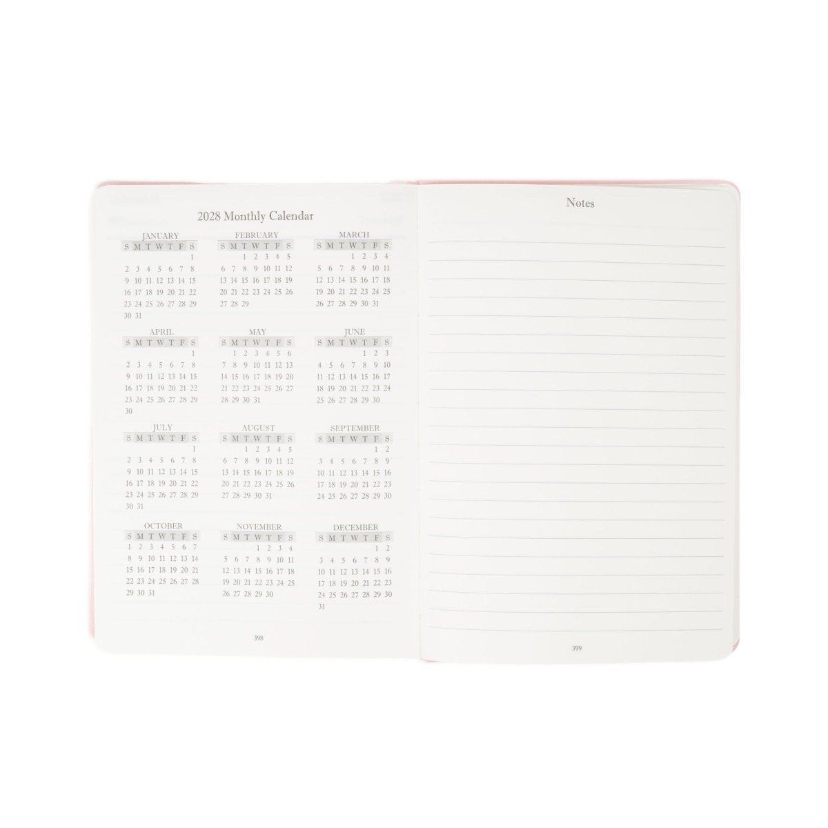 Executive journal open with 2027 monthly calendar on left and lined notes on right.