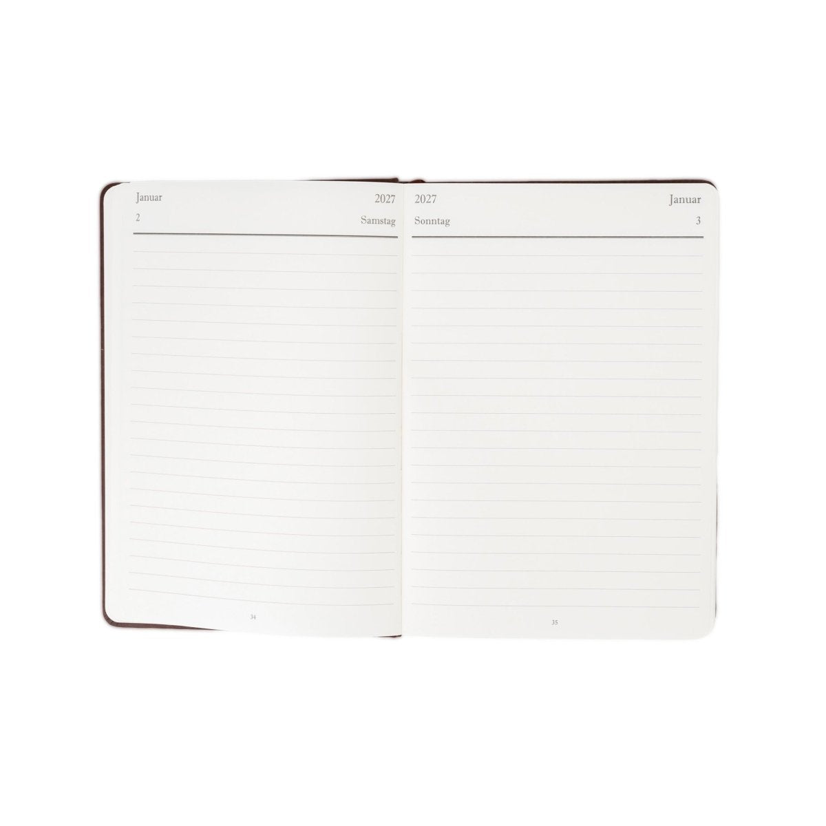 Executive journal planner open to weekly schedule pages, dark cover, 2027 layout.