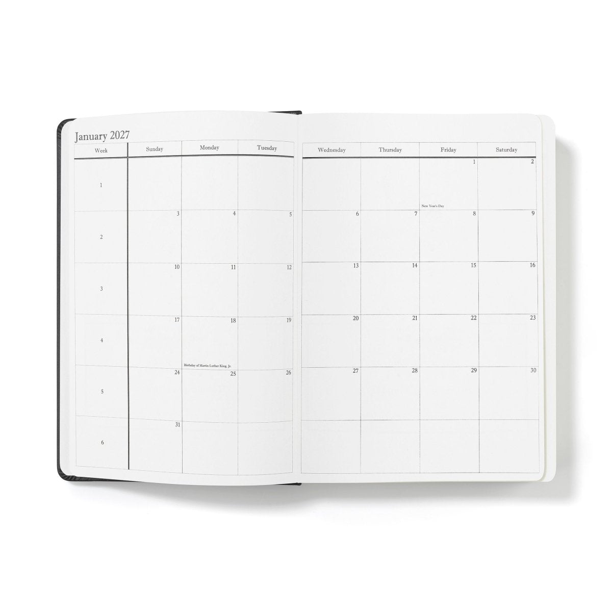 Executive journal open to January 2027 monthly calendar grid with weekday columns