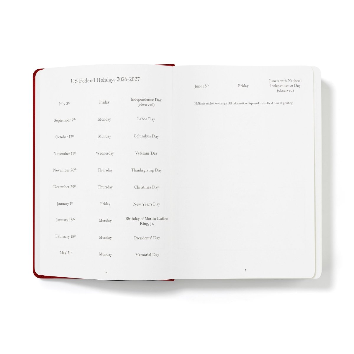 Open journal page listing US federal holidays, with red spine edge