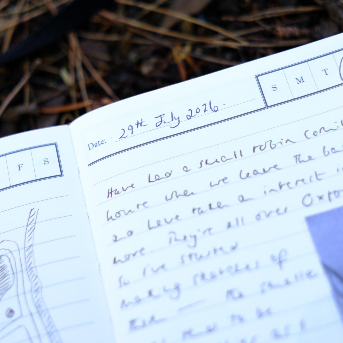 Close-up of undated executive journal page with handwritten date and notes