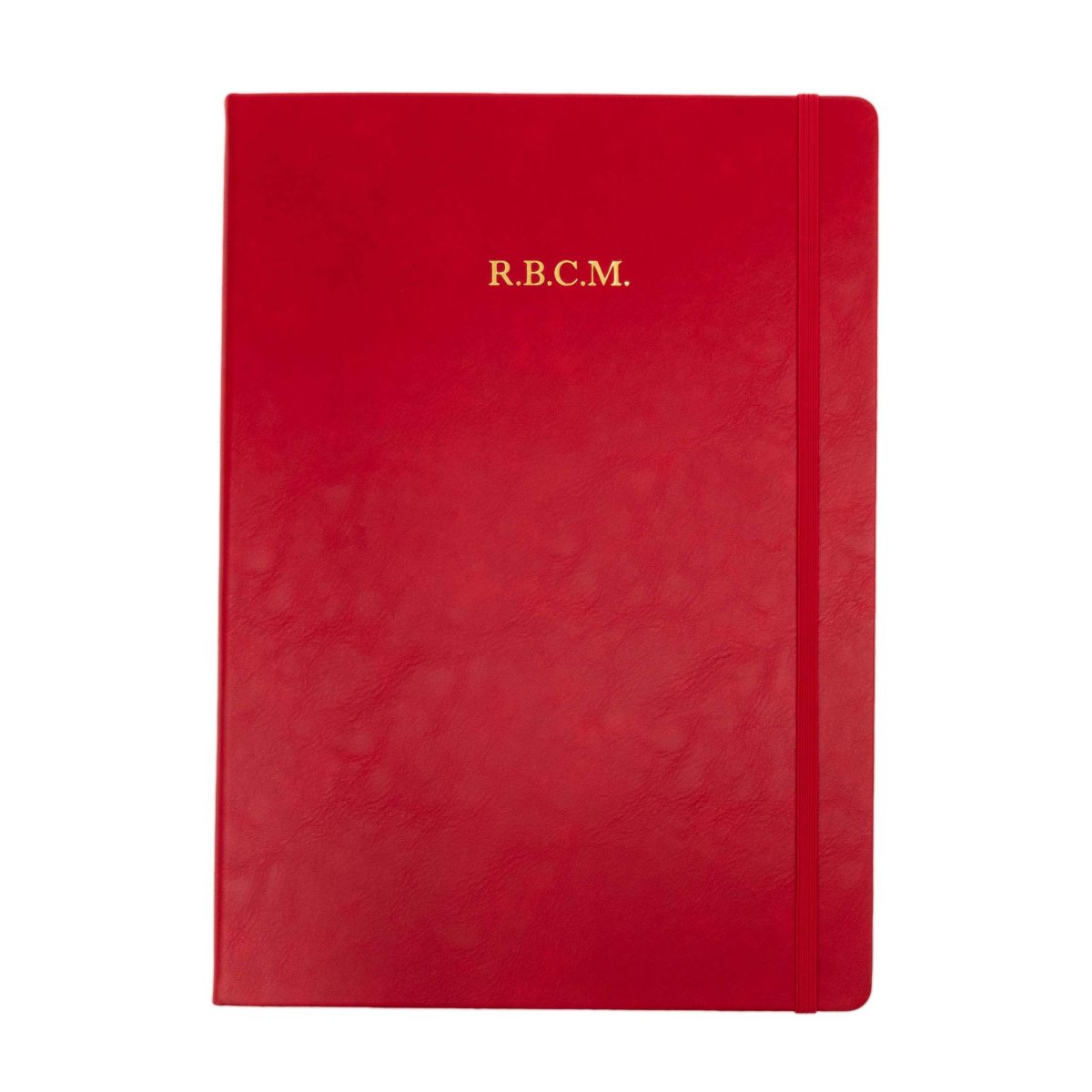 Red executive notebook with side spine seam and embossed “R.B.C.M.” on front cover