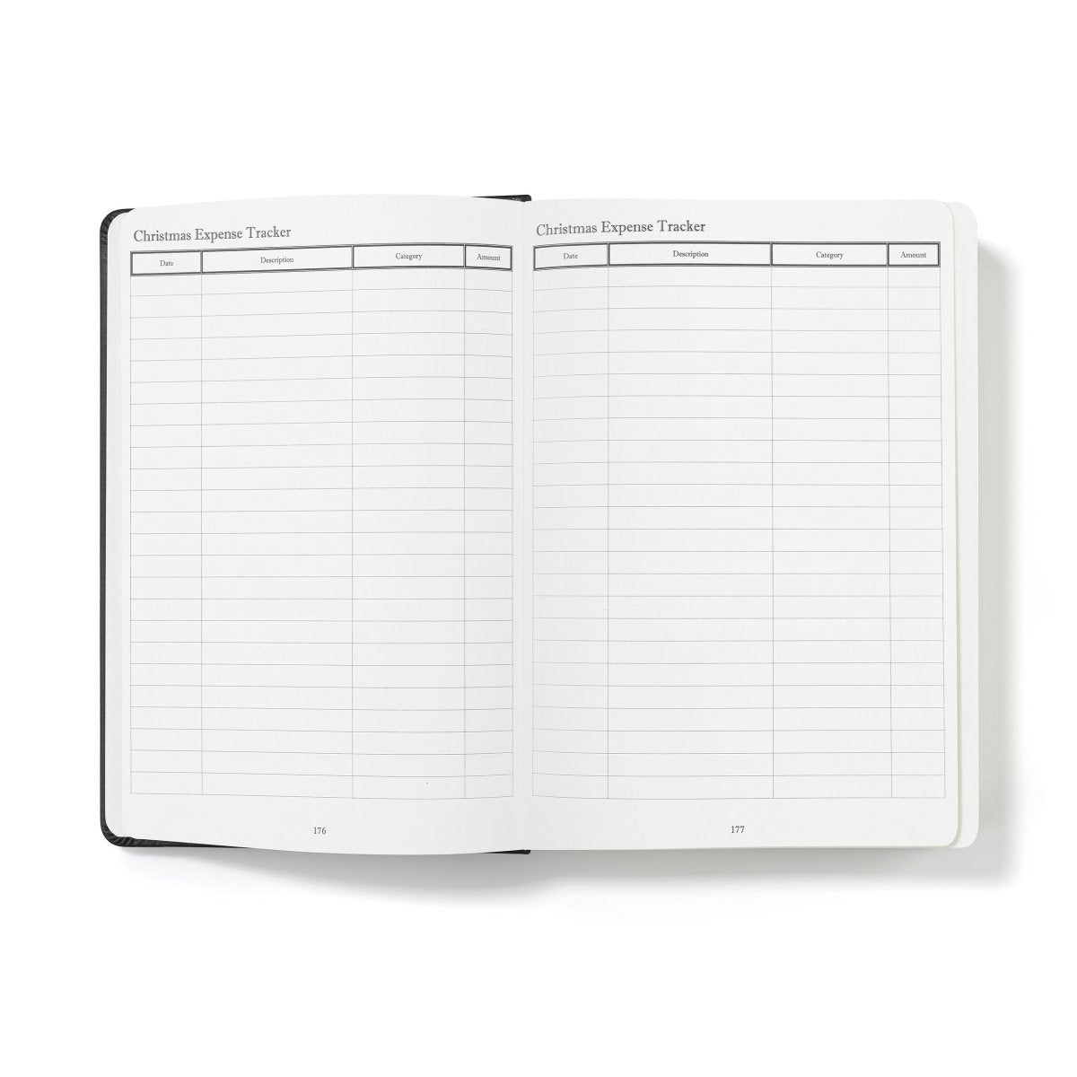 Open financial planner showing expense tracker sections with ruled table grids