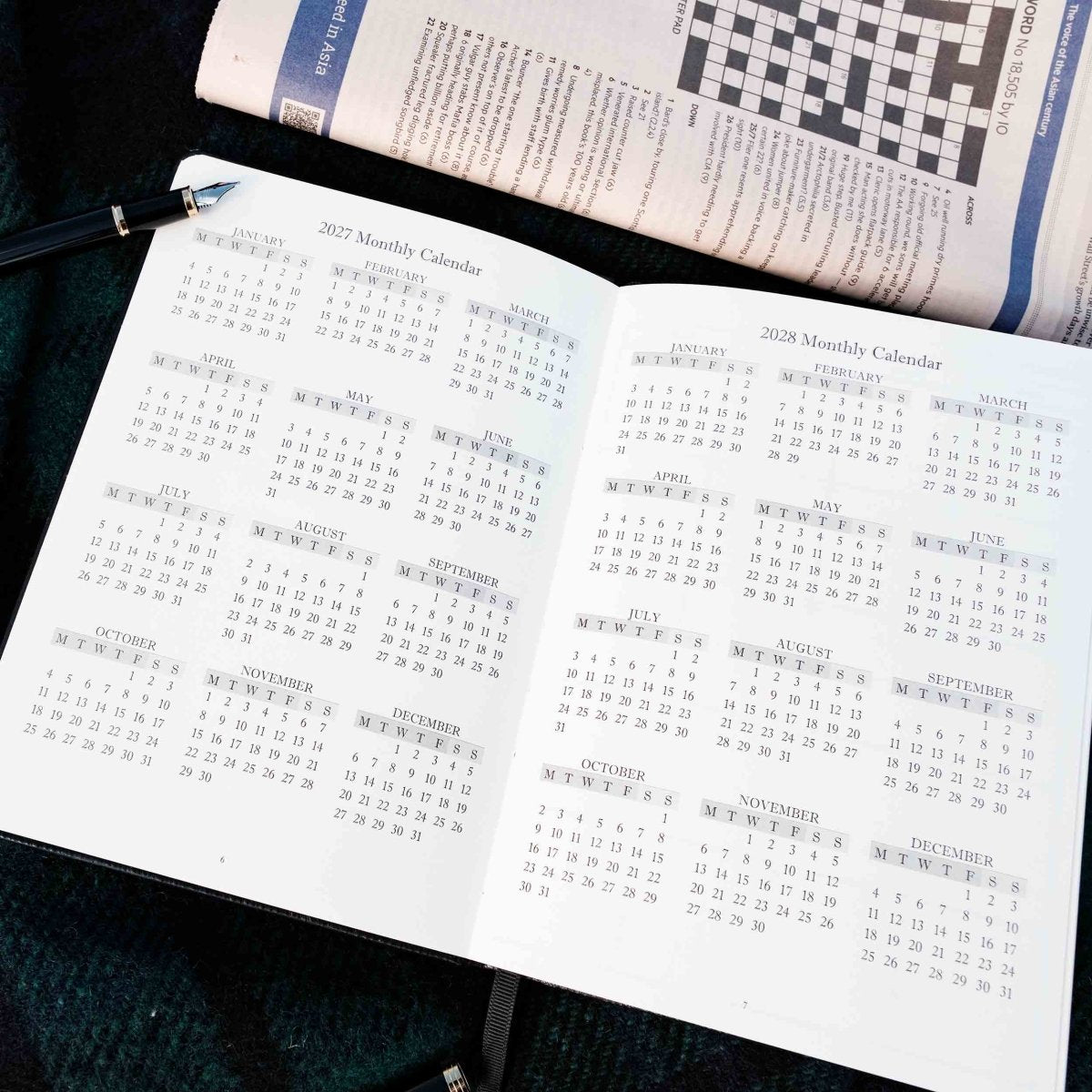 Weekly journal open to 2027 and 2028 monthly calendar overviews