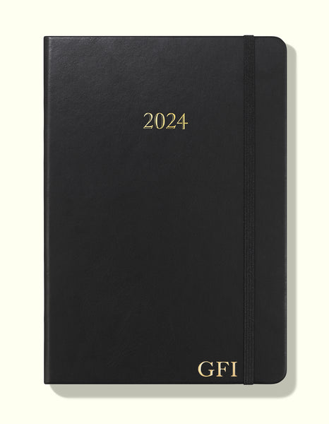 black 2024 daily journal in a5 front with personalisation included sitting on blank background