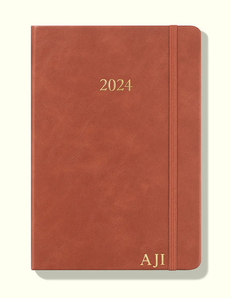 brown 2024 daily journal front in a5 with personalisation sitting on blank background