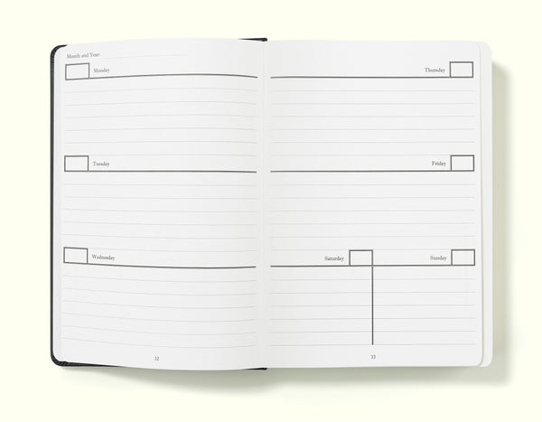 week-to-view diary pages of black weekly planner in a5 on a blank background
