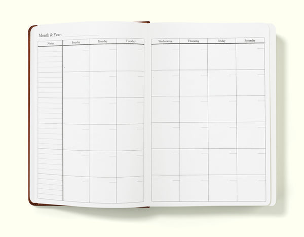 monthly planning pages of brown 2024 daily journal in a5 sitting on blank background