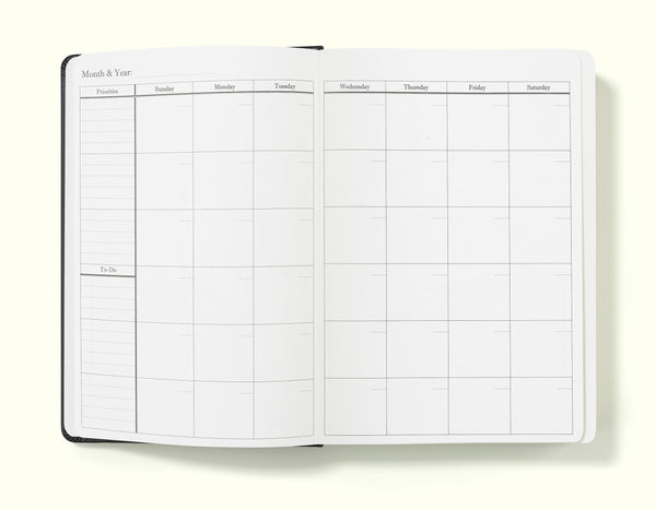 monthly planner of black weekly planner in a5 on a blank background