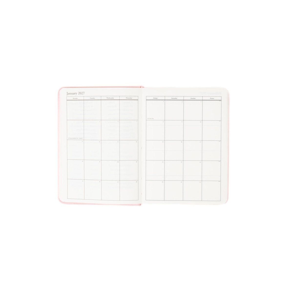 Planner interior open spread showing monthly calendar grid and lined notes