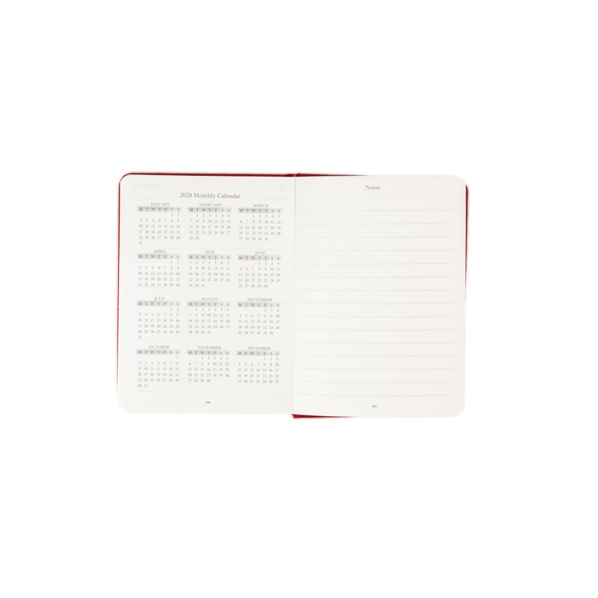 Planner interior open spread with monthly calendar grid and holiday section