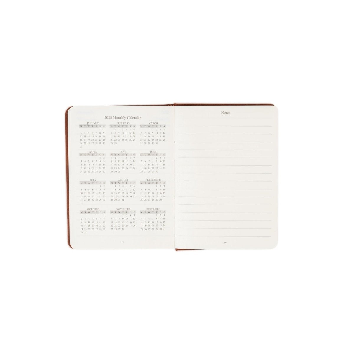 Brown-trimmed 2027 executive journal open to monthly calendar and notes pages.