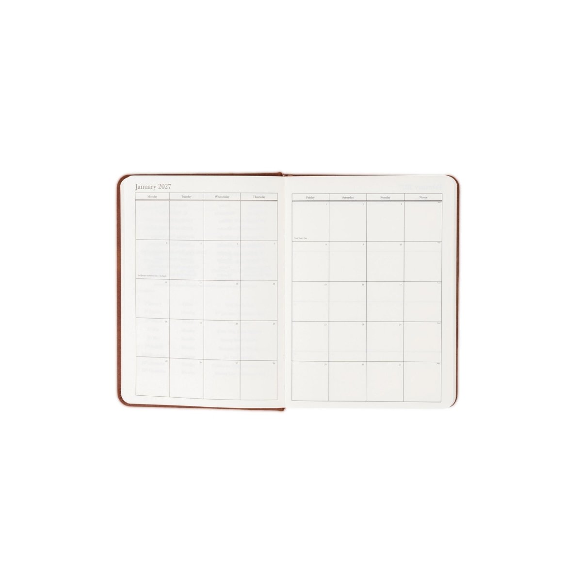 Planner interior open spread with monthly calendar grid and lines for notes