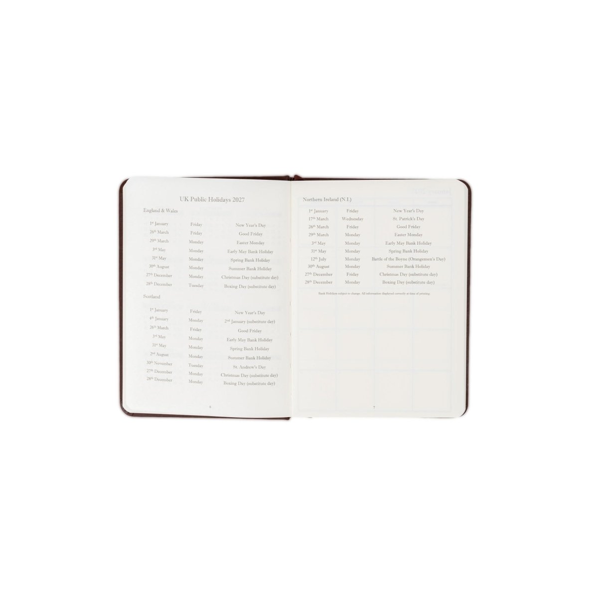 Planner interior open spread with holiday list on left and calendar grid on right