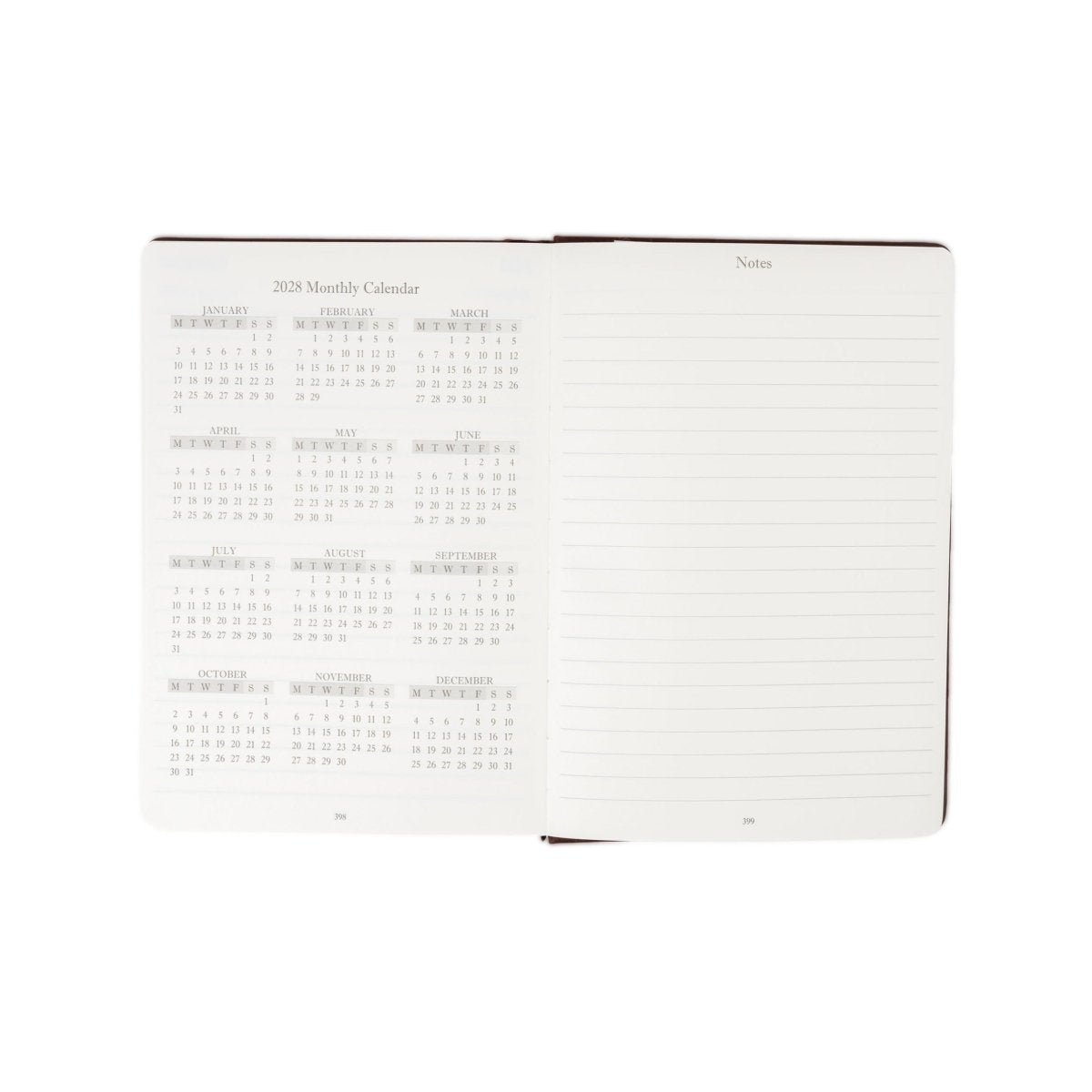 2027 journal open to monthly calendar pages with a notes section