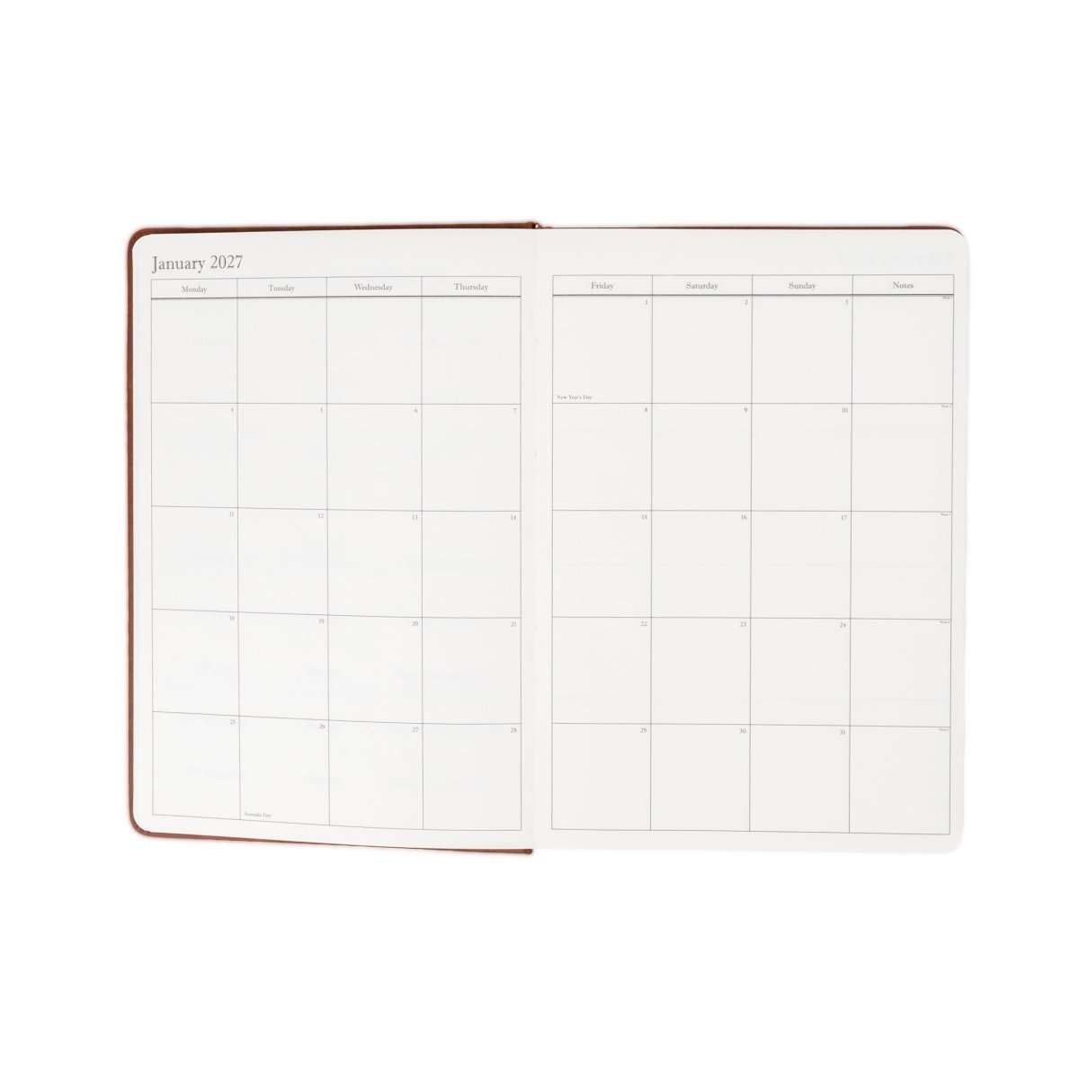 Open 2027 calendar spread with monthly layout grids across both pages