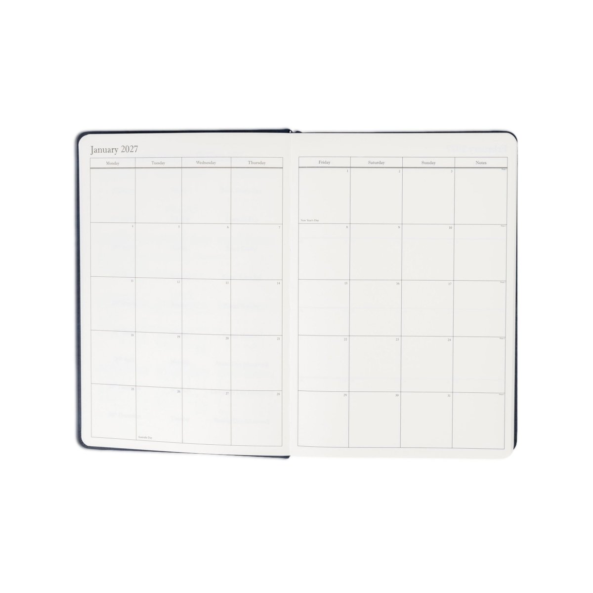 Opened 2027 monthly calendar spread with grid pages for planning
