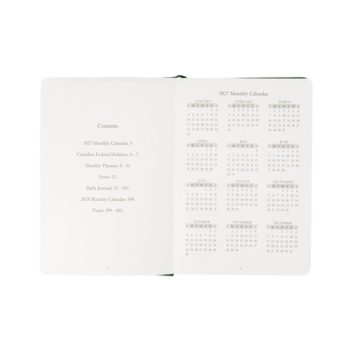 Executive journal open to contents and 2027 monthly calendar on facing pages.