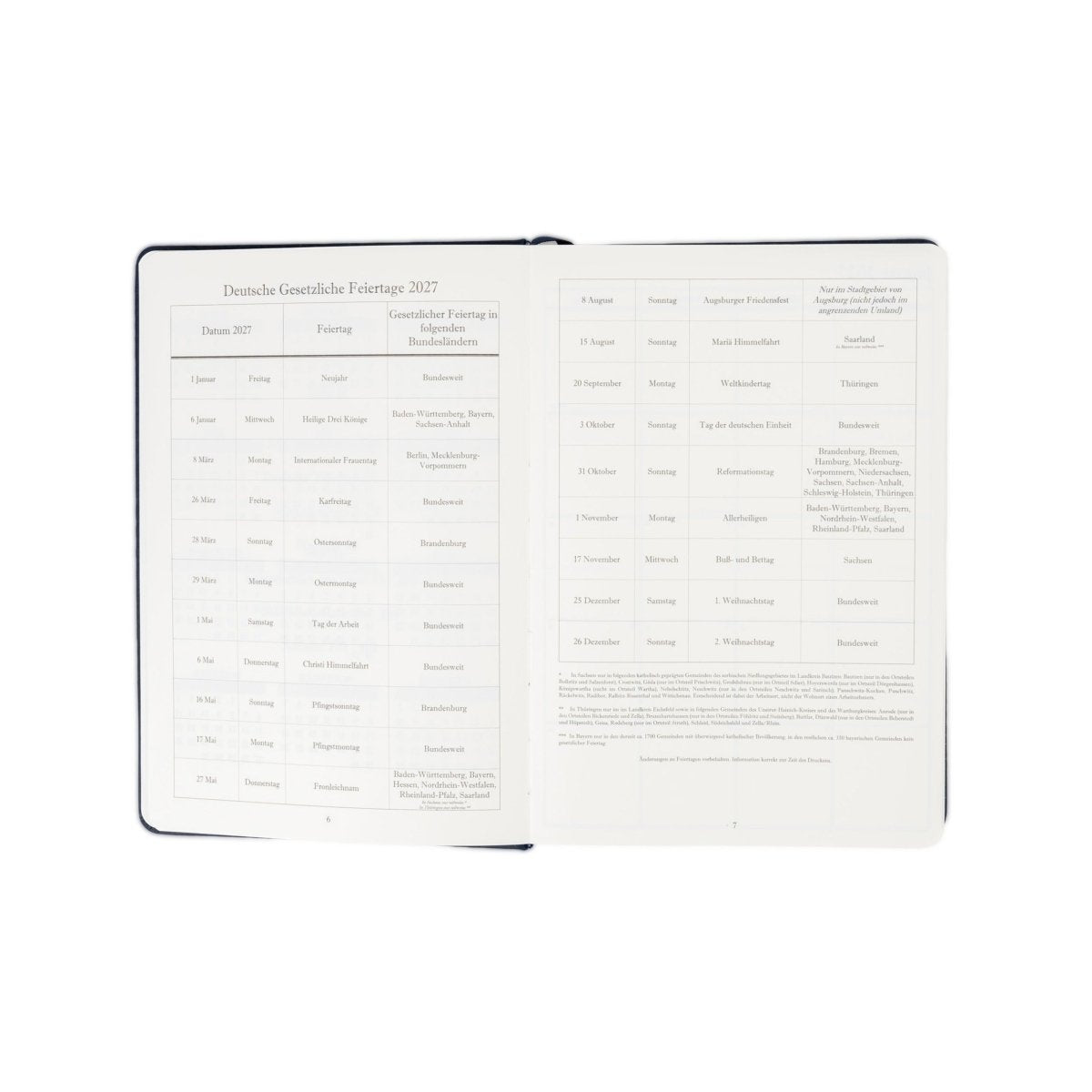 Open 2027 journal with German holiday panel on left and lined notes on right