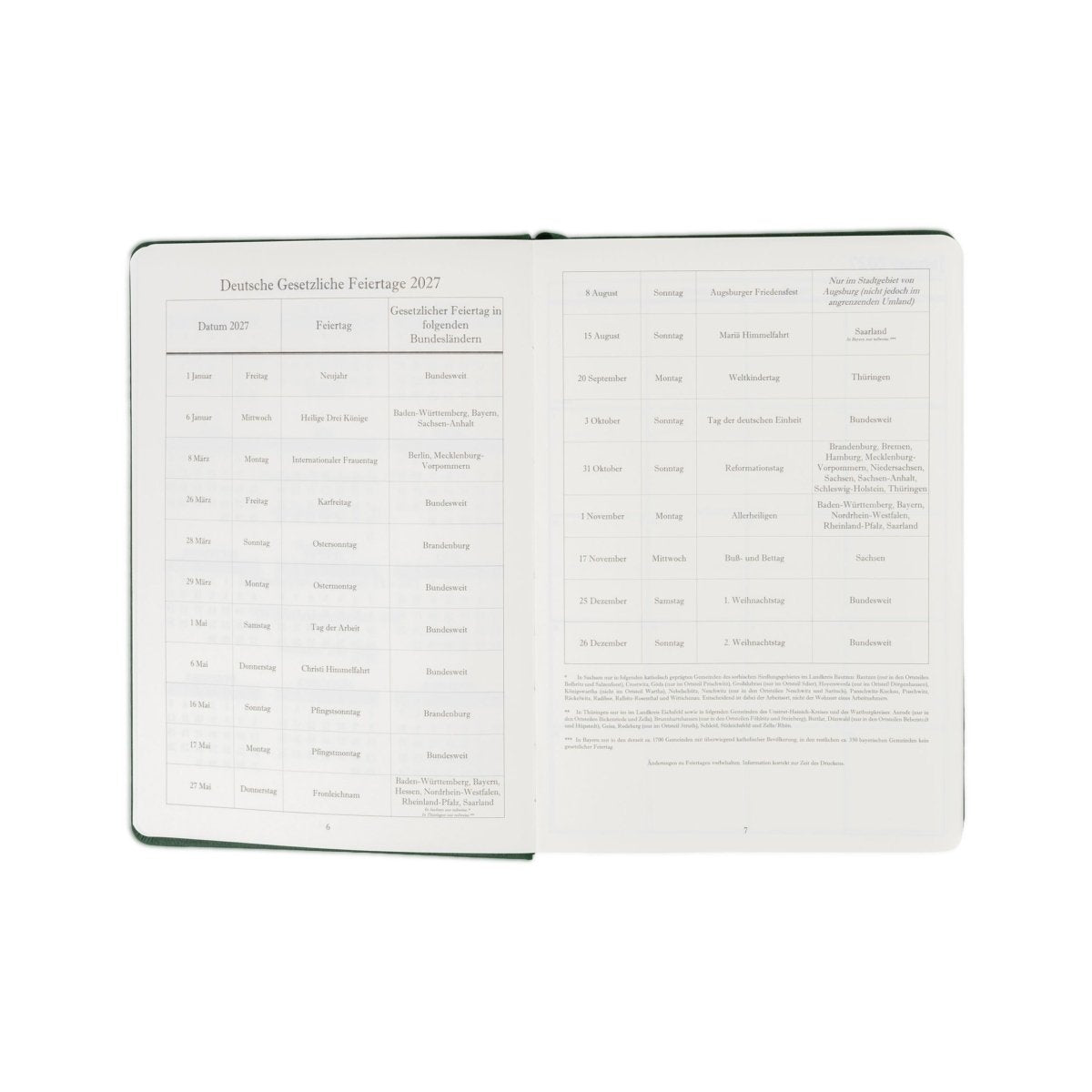 Open 2027 executive journal showing German holiday calendar and lined notes pages