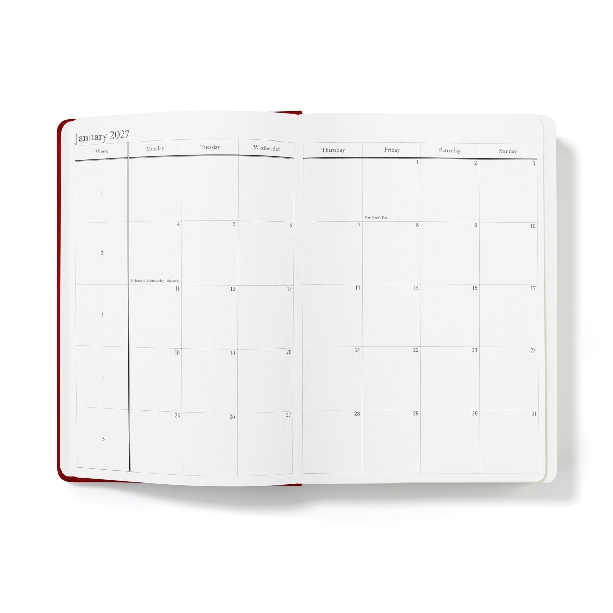 Executive journal open to January monthly view with grid days and date numbers