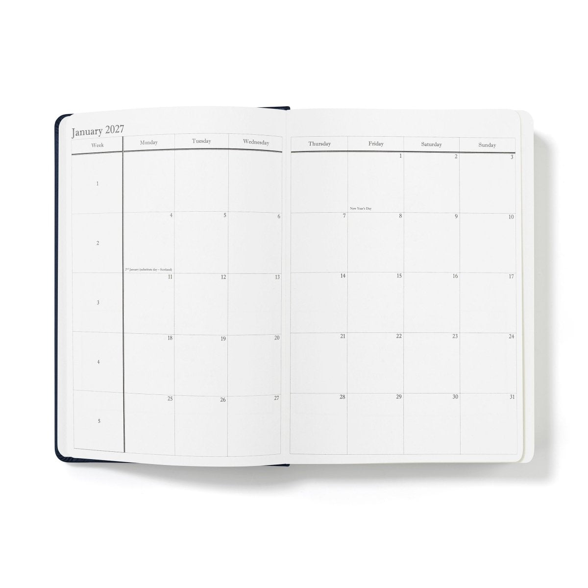 Mid-year executive journal open to January 2027 weekly calendar grid pages