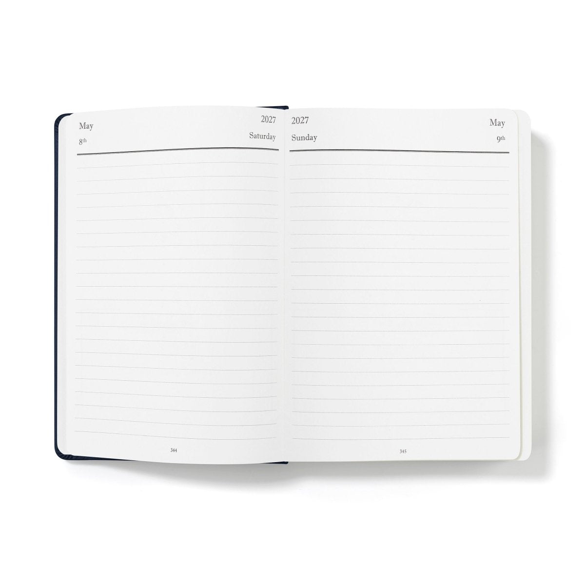 Mid-year executive journal open to May 2027 planning with lined sections