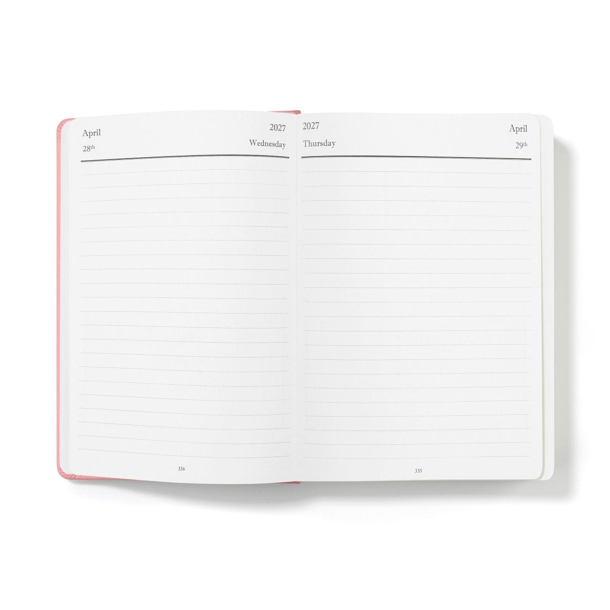 Pink-edged open planner pages with lined monthly layout