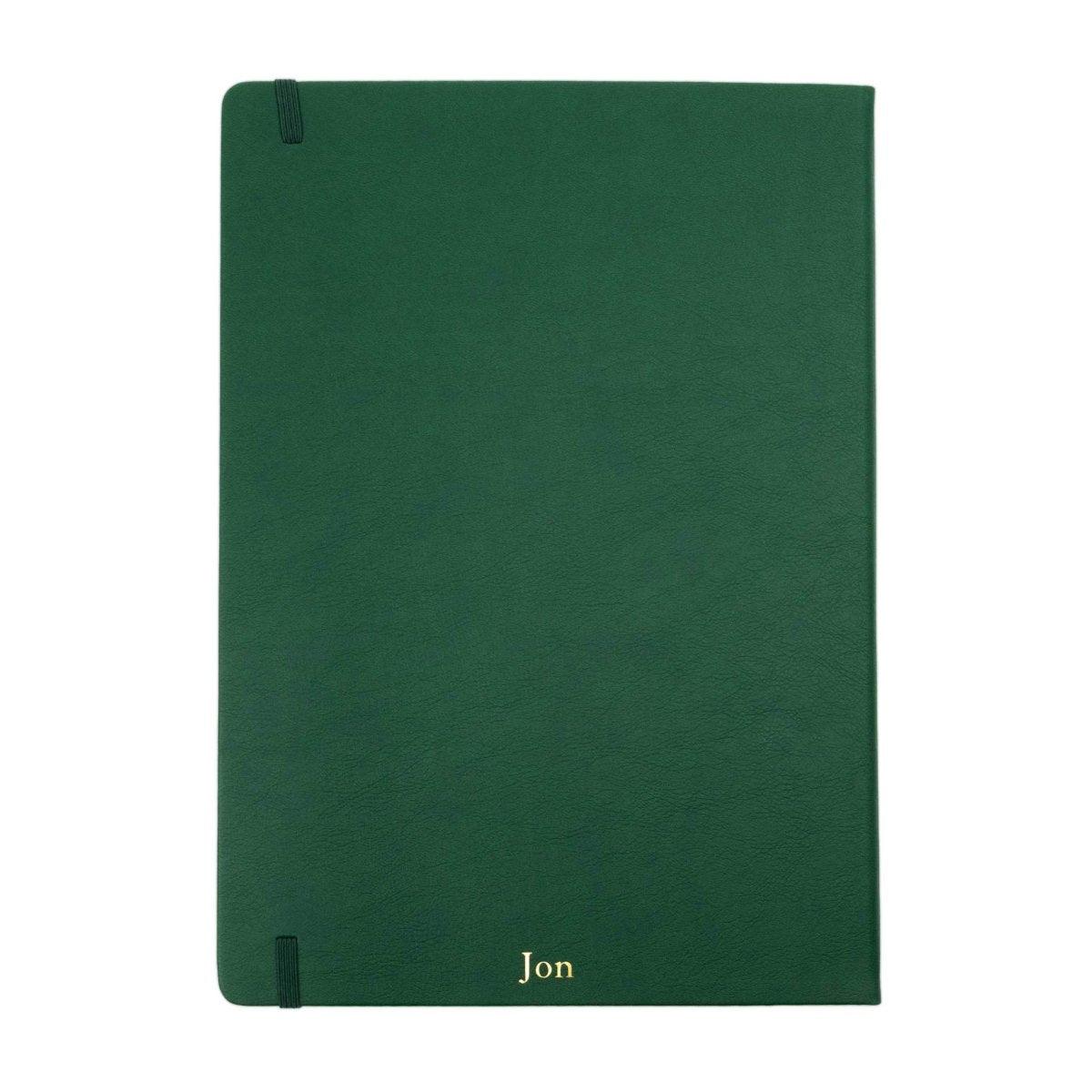 Executive notebook with blank cover, deep green leather-look and Jon monogram on front.