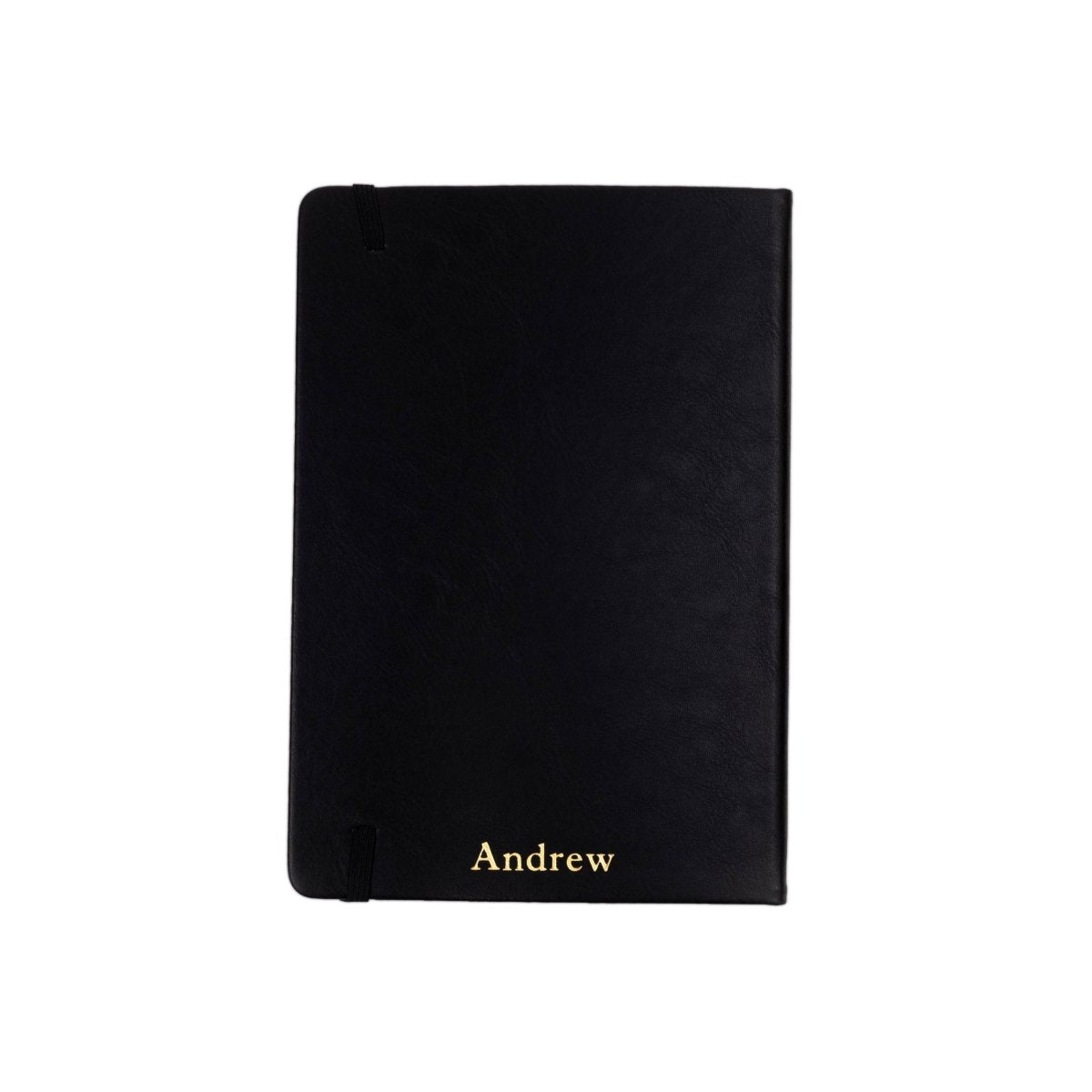 Black executive notebook with Andrew name text near the bottom and leather-look cover texture.
