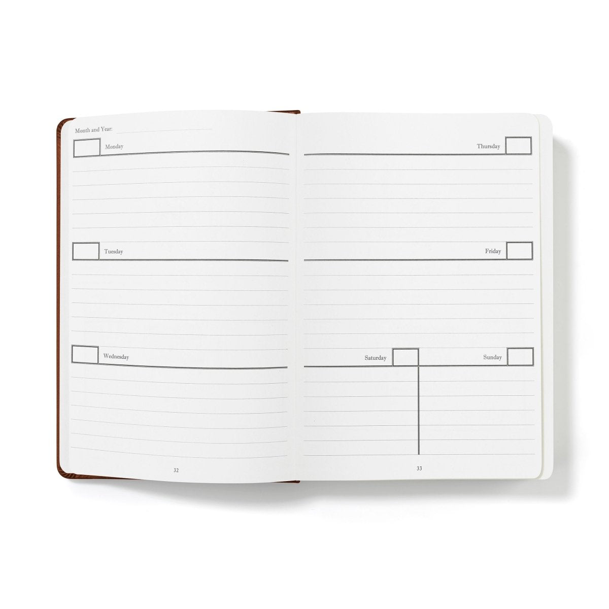 Weekly productivity planner journal, open with lined weekly layout pages