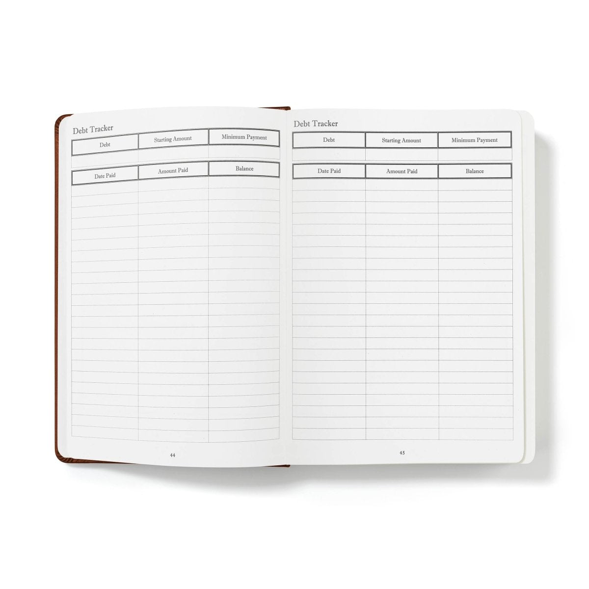 Financial planner journal open to debt tracker tables with categories and columns.