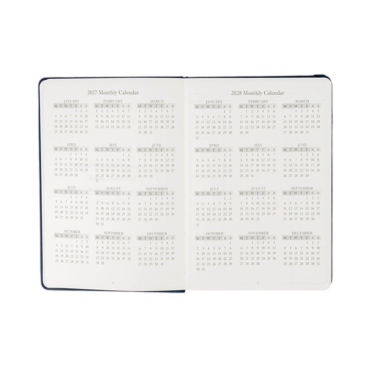 2027 weekly planner journal, open view with monthly calendar pages and date grid